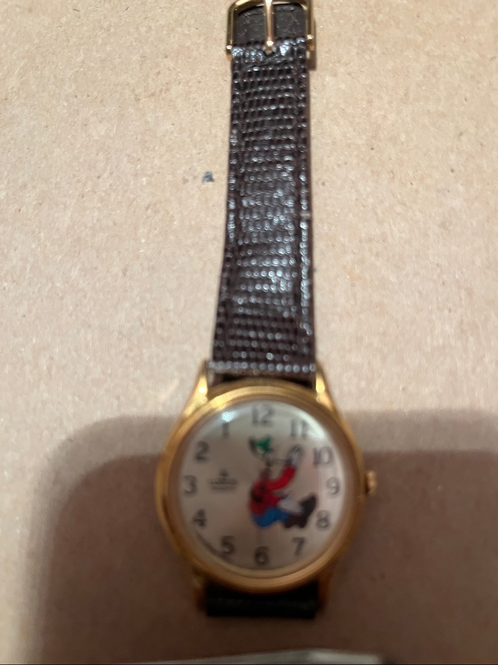 Gold tone vintage unisex Goofy watch by LORIS DISNEY